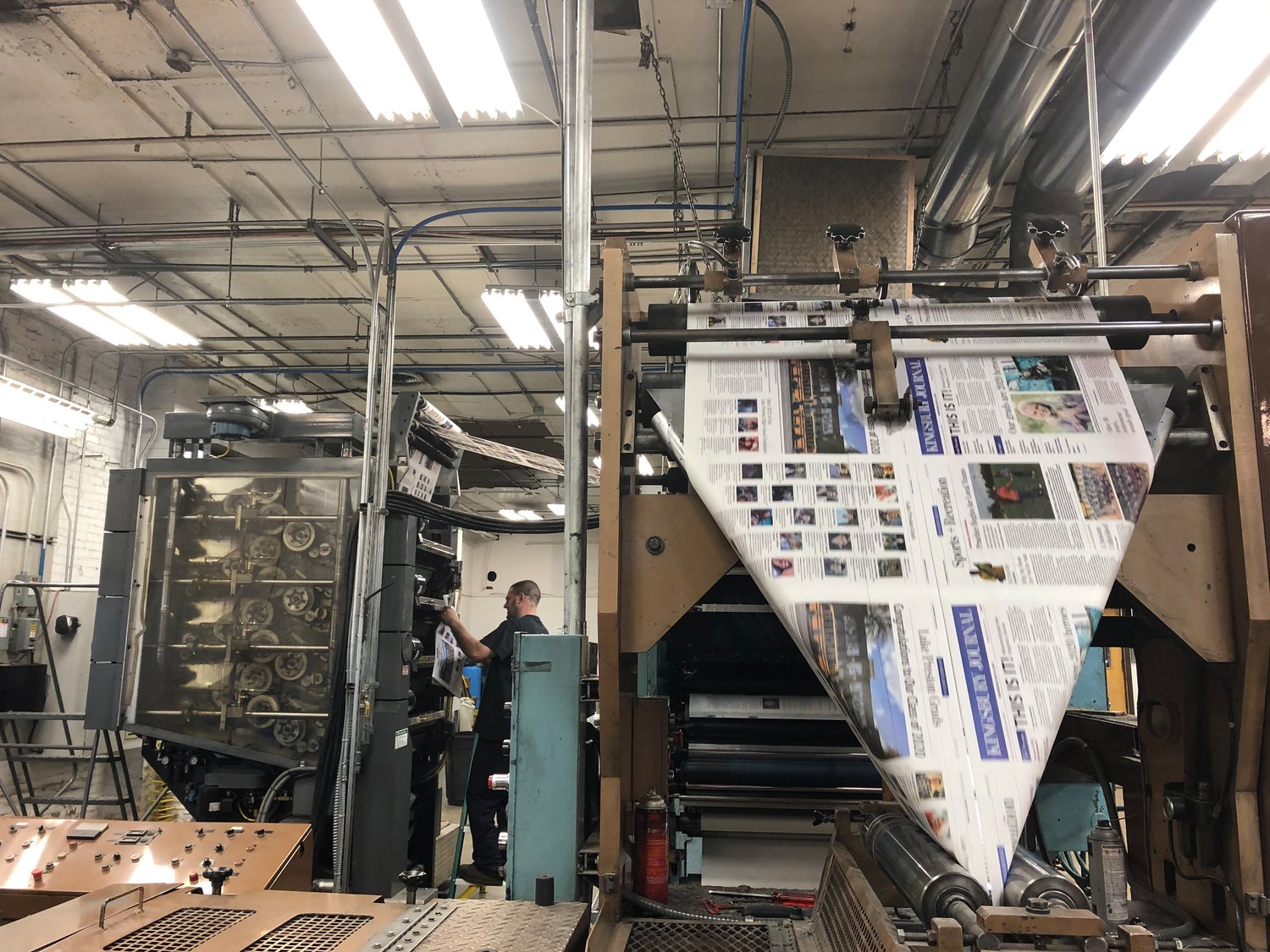 After printing, pages are folded into the correct order and then cut, resulting in a completed newspaper. The stream of paper is constant and allows thousands of papers to be produced in minutes.