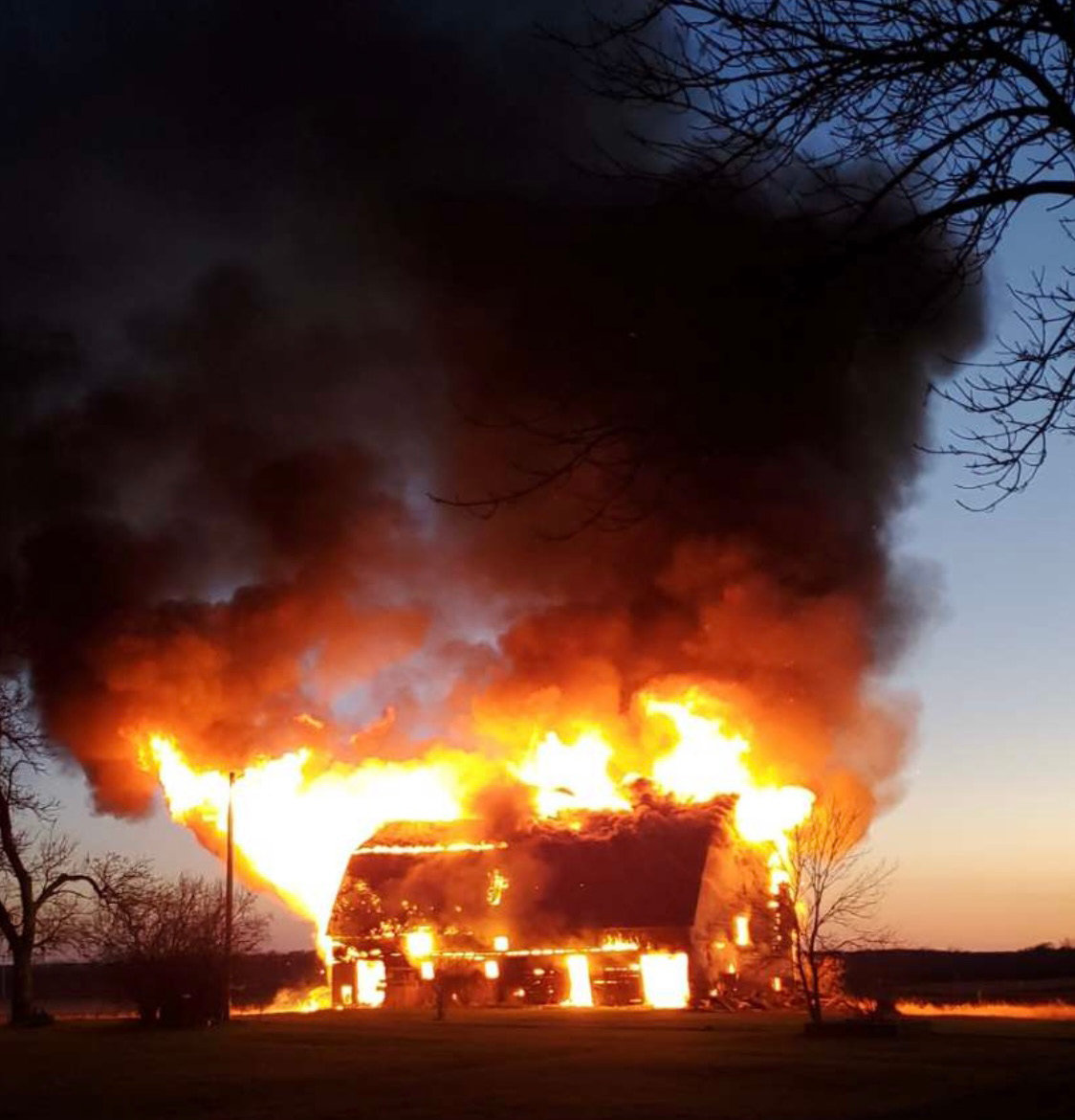 A calm South Dakota night plus four inches of rain last week made it the perfect night on Saturday to burn down a collapsing barn on Casey Anderson's acreage just south of Oldham.