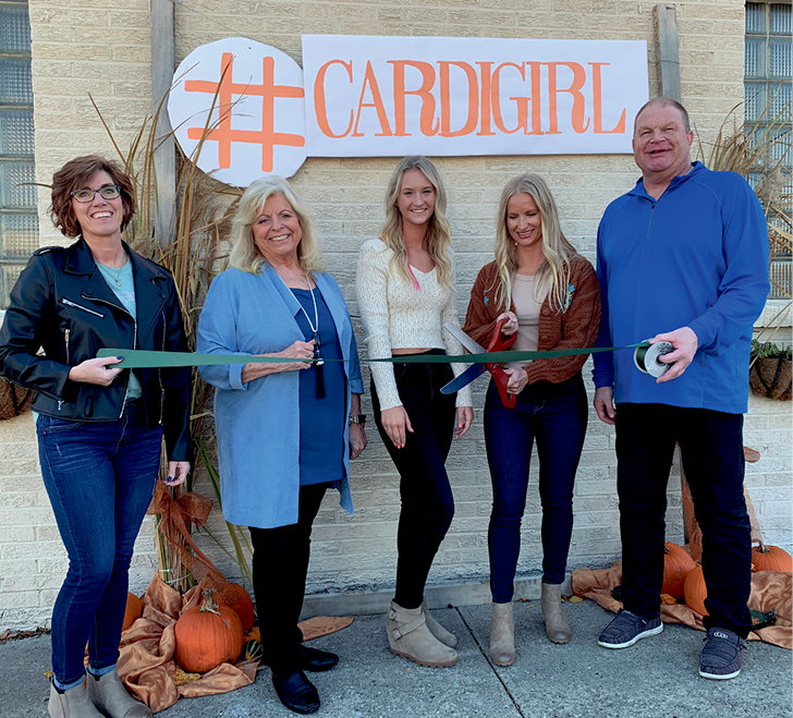 Cardi Girl celebrated their Grand Opening with a ribbon cutting ceremony. Amy Kruse, left, Rita Anderson, Camryn Schmidt, Victoria Albrecht and Chad Kruse kicked off the day’s festivities Saturday.