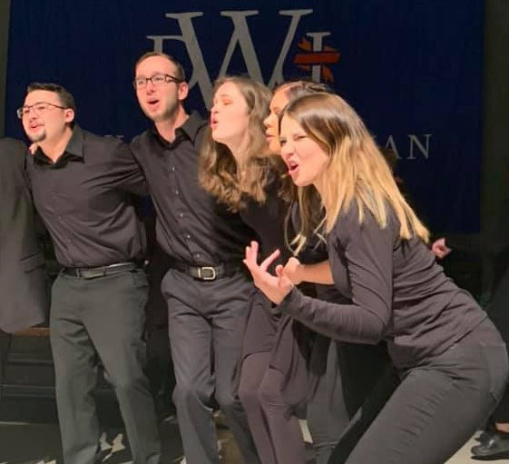 Hannah Wehlander, front right of picture, is shown with other DWU students performing at “All Together Now” to celebrate the return of live performances.