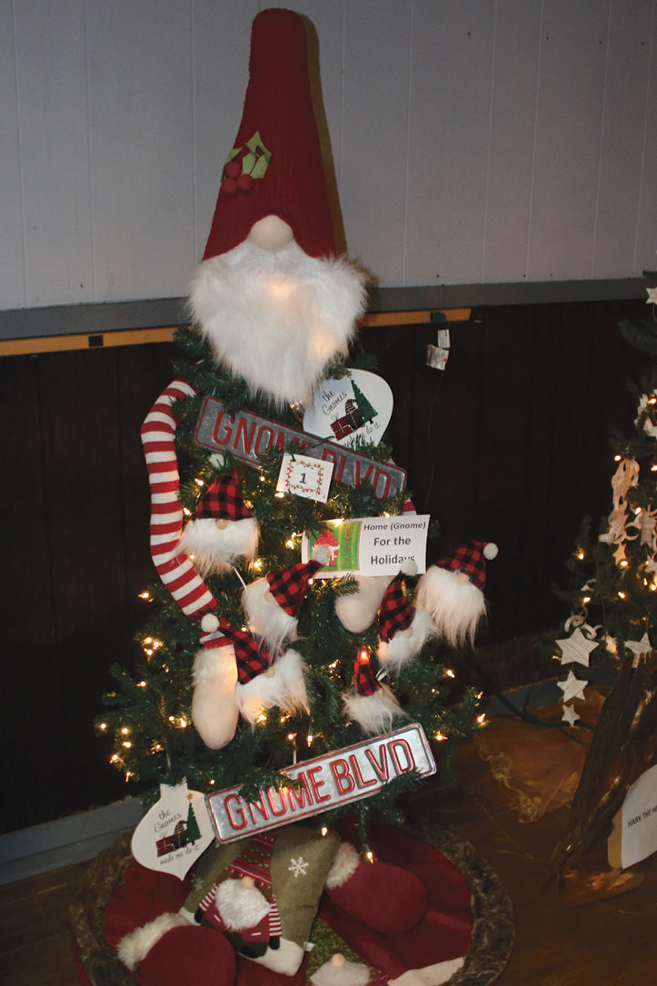 First Place for the silliest tree went to De Smet Flowers and Gifts for their tree with the theme, Home “Gnome” for the Holidays. The tree had Gnome Blvd. signs placed on the tree, and various gnomes hung from its branches.