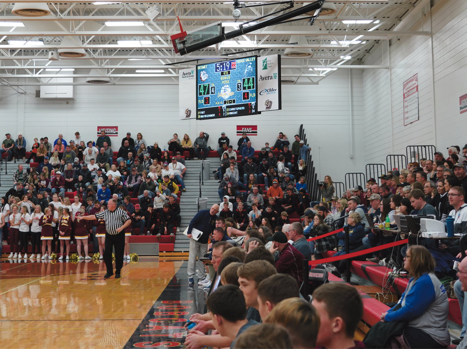The gym was packed in Brookings for the last South Dakota high school basketball game of 2021, featuring a showdown between Class A #1 Sioux Valley and Class B #1 De Smet. De Smet outlasted Sioux Valley in a hard-fought battle, winning 55-47. More on the game, page 24.