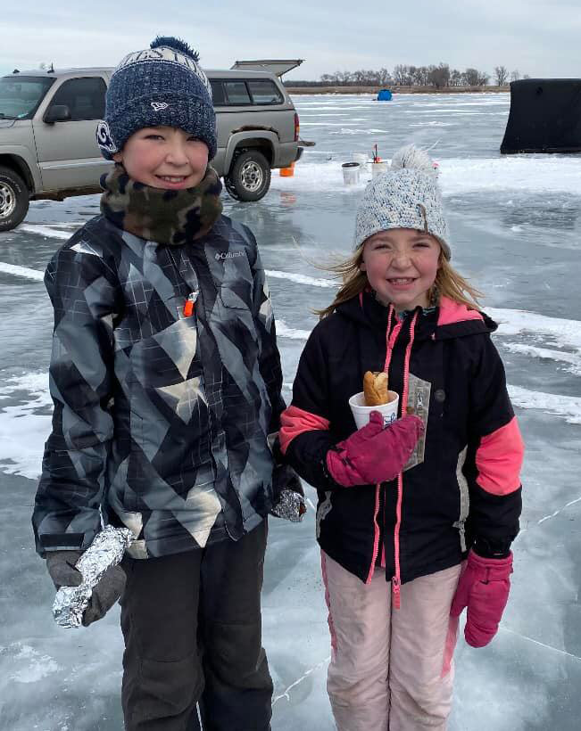 Participants in the Future Fisherman Derby at Lake Thompson take a break for lunch.