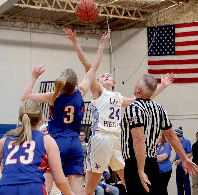 Faith Steffensen jumps to get the ball during the Hitchcock-Tulare game. It was a nail-biter of a game, but the ladies came out ahead 45-44.