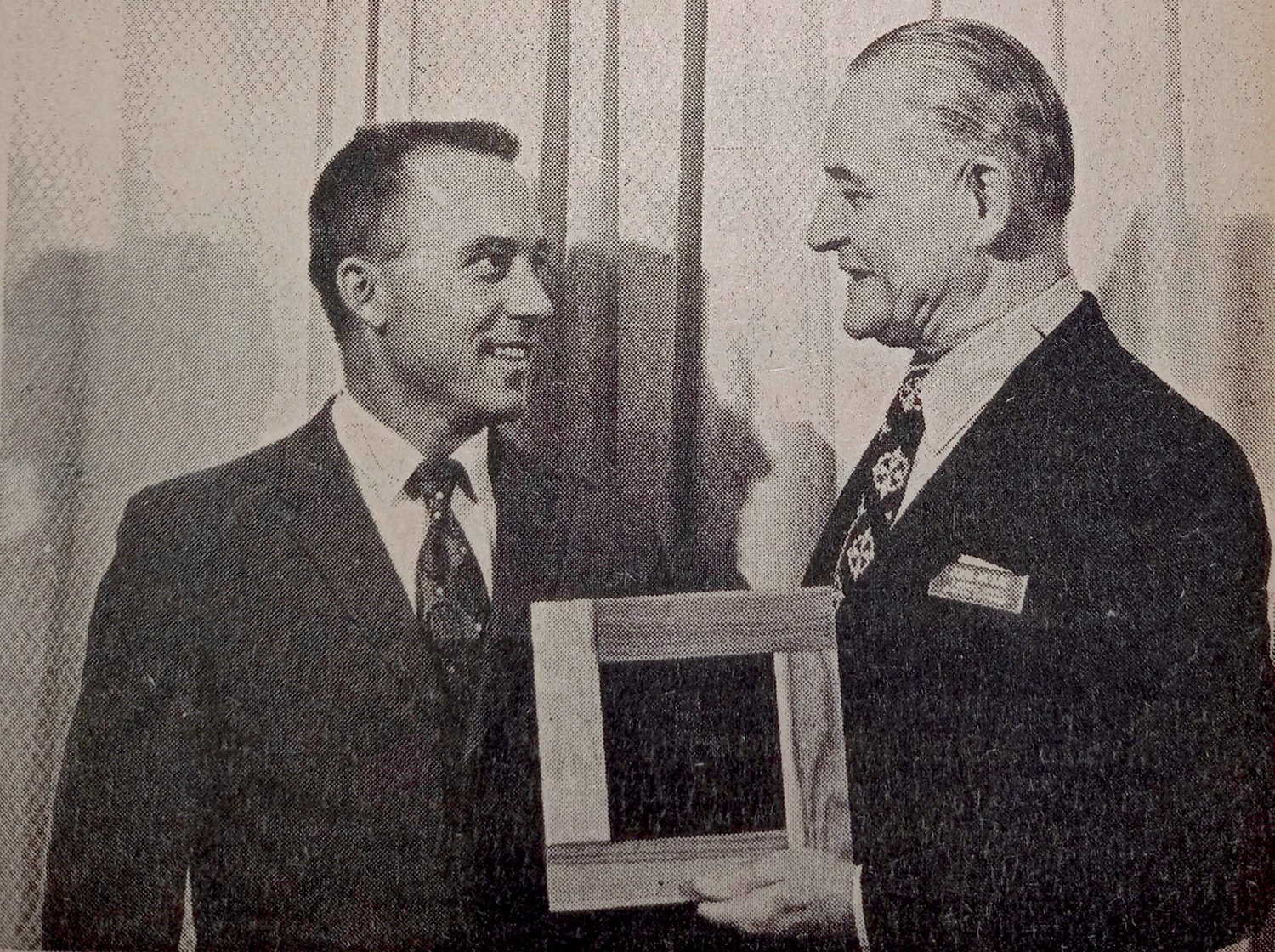 FIFTY YEARS AGO: Farmers Union Oil Company of De Smet, managed by Larry Cheney, was one of 207 cooperatives in nine states that received a 1971 Sparkle Award from Farmers Union Central Exchange. John McKay, right, marketing division director for the regional supply co-op, presented the award to Cheney, left. This is the fifth time the De Smet station has won the award.