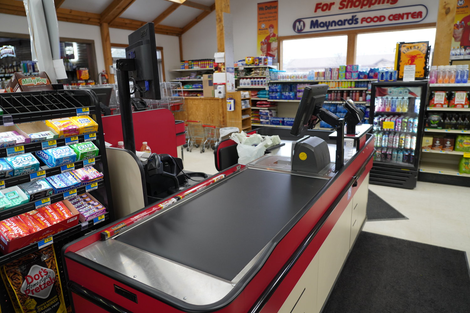 Maynard’s Grocery Store in De Smet has recently installed new check-out counters, thanks to some help from Kingsbury Electric. The new counters include a slide-out desk for patrons in wheelchairs, a conveyor belt, and the back end is sloped to allow the groceries to slide/roll away from the cashier. Store Manager Bob Blaha says feedback from cashiers has been positive, and the new system is great for their backs. Other changes in store for Maynard’s include improvements to the produce section, the arrival of new carts in about a month and an upgrade for the candy and impulse buy shelves in front of the registers.