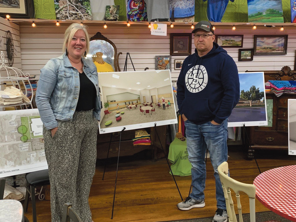 Abi Van Regenmorter, left, and Terry Holland set up the Laura Ingalls Wilder Elementary proposed renderings if the bond is passed on June 21. They will also be setting up these renderings and talking with the public again on June 16 at The Oxbow from 8:30-10:00 a.m. and 2:30-4:30 p.m. if you would like to stop by and ask questions and see all the proposed renderings.