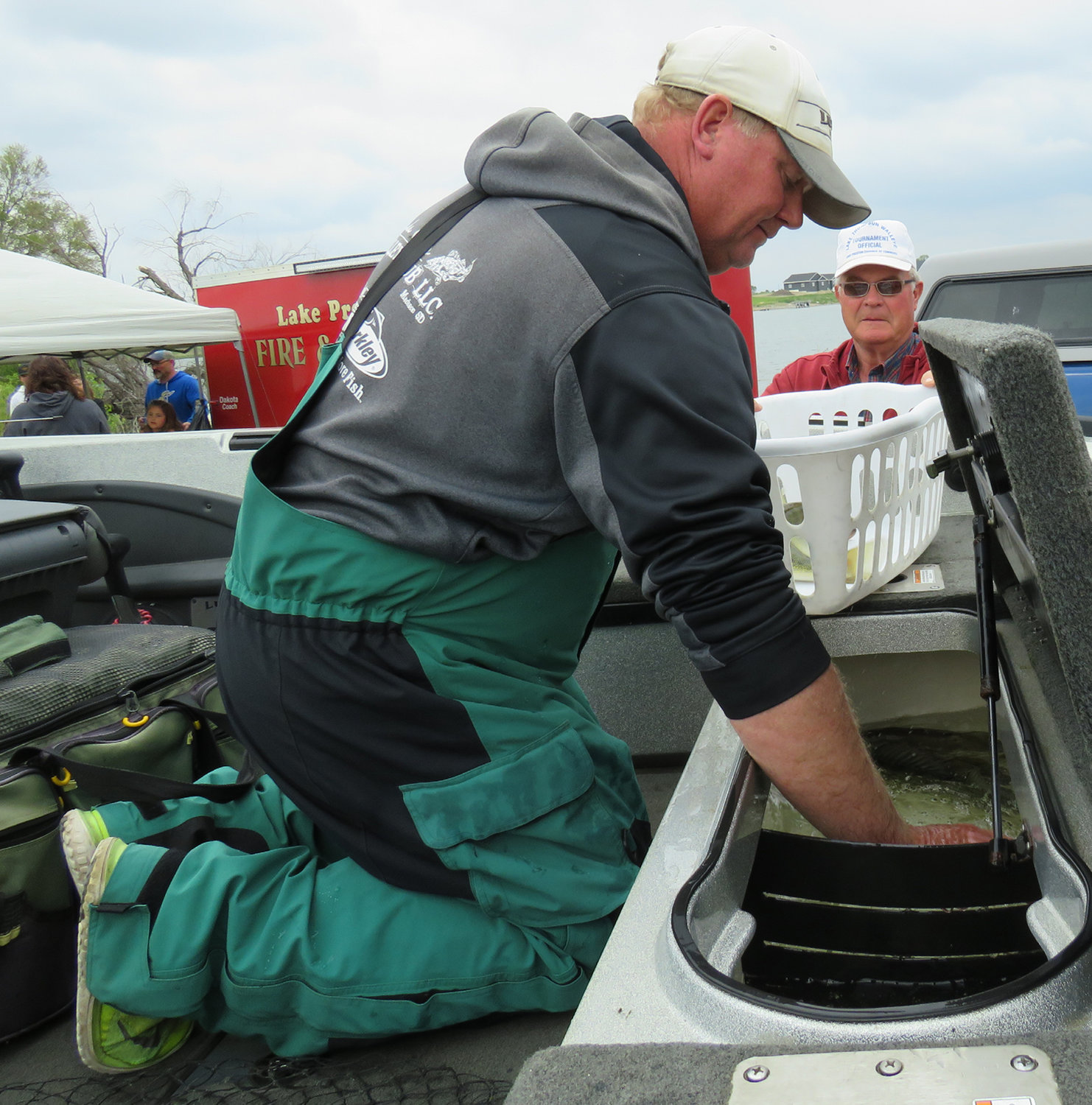 James Molengraaf of White, S.D., is pulling fish out of the livewell for Sunday's weigh-in at the 33rd Annual Lake Thompson Walleye Tournament. Molengraaf has participated in this event for many years and is consistently a top finisher.