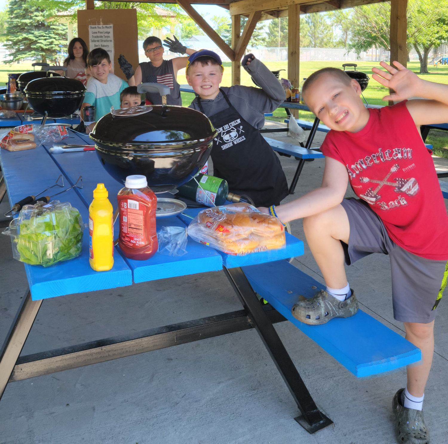 There was a Kids Que competition on Saturday with eight kids participated in the hot dog making contest and 13 in the hamburger contest. These kids found some clever ways to dress up their food like putting condiments on them and making pigs in a blankets.