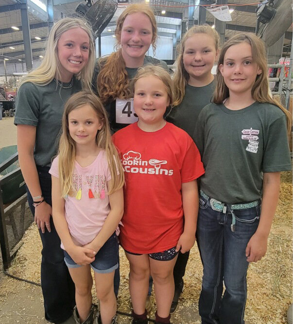 Ava Malone, left, Hadlee and Bentlee Holt, Khloe Olson and Kinzlee Olson and Cambree Holt all attended the Charolais Junior National Show and Leadership Conference in Nebraska.