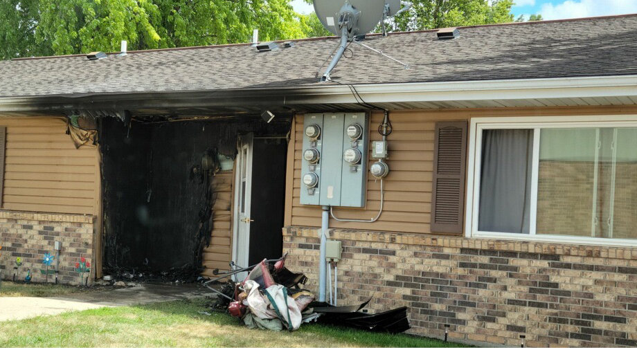 The entrance of a Lake Preston apartment building was damaged during a fire on Thursday afternoon.